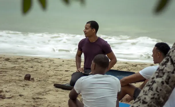 Hatha yoga on the beach