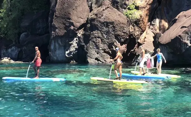 Step paddle on translucent water