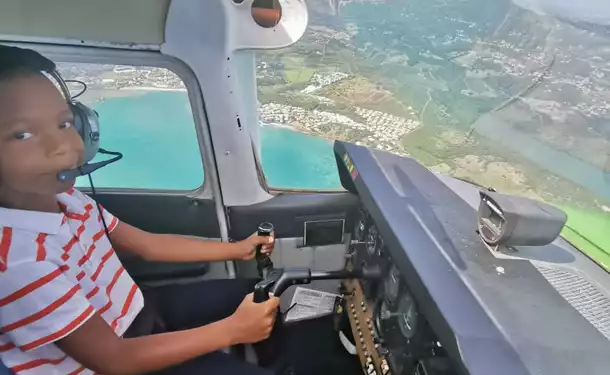 Martinique seen from the sky at the controls of a plane