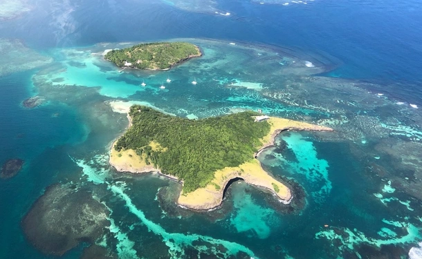 Martinique seen from the sky at the controls of a plane
