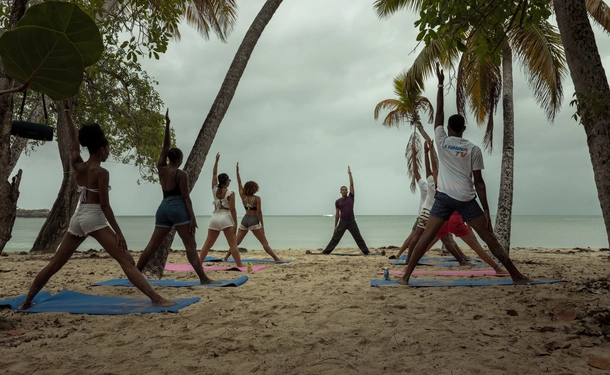 Hatha yoga on the beach