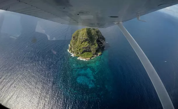 Martinique seen from the sky at the controls of a plane