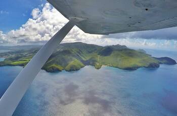 Martinique seen from the sky at the controls of a plane