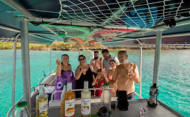 Webbed snorkeling by boat (on the corals)