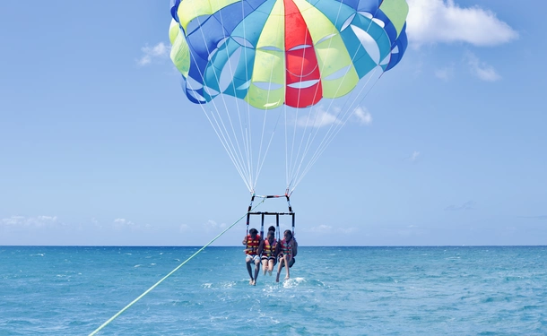 Thrill-seeking parasailing - Tourcrib